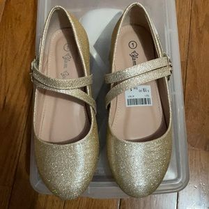 Little girls gold shoes